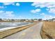 Neighborhood with walking path and pond at 6559 Seabiscuit Rd, Whitestown, IN 46075