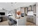 Modern kitchen with stainless steel appliances and an island with seating at 6559 Seabiscuit Rd, Whitestown, IN 46075