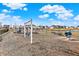 Community playground with swings and play equipment at 6559 Seabiscuit Rd, Whitestown, IN 46075