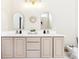 Elegant bathroom features dual vanities, stylish mirrors, and modern fixtures at 9519 Summer Ridge Pl, Indianapolis, IN 46260