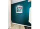 Bathroom featuring dark teal walls, light tiled floors, and new fixtures at 9519 Summer Ridge Pl, Indianapolis, IN 46260