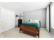 Comfortable bedroom with plush carpeting, closet, and a large window to let the sunlight in at 9519 Summer Ridge Pl, Indianapolis, IN 46260