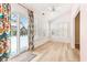 Sun room features a ceiling fan, tile floors, and natural light at 9519 Summer Ridge Pl, Indianapolis, IN 46260