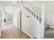 Spacious entryway with tiled floors and a staircase with white railing at 10322 Sage Ct, Noblesville, IN 46060