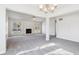 Spacious living room with fireplace and access to backyard at 10322 Sage Ct, Noblesville, IN 46060