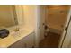The bathroom offers a sleek vanity with modern fixtures and a shower-tub combination at 1144 Ridgevine Rd, Greenwood, IN 46143