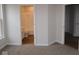 This bathroom features a tub-shower, toilet, and vanity, conveniently located next to the bedroom at 1144 Ridgevine Rd, Greenwood, IN 46143