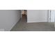 Comfortable bedroom featuring neutral carpet and an open doorway, providing easy access and a welcoming feel at 1144 Ridgevine Rd, Greenwood, IN 46143