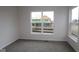 The bedroom is bright with natural light and features neutral walls and large windows at 1144 Ridgevine Rd, Greenwood, IN 46143