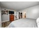 A well-lit bedroom with a large closet and a view into an ensuite bathroom at 12301 Van Spronsen Ct, Indianapolis, IN 46236