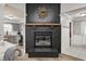 Cozy fireplace with decorative wreath adding warmth and character to the inviting living space at 12301 Van Spronsen Ct, Indianapolis, IN 46236
