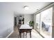 Bright dining area with tile floors and a view into the kitchen at 12643 Feldspar Rd, Indianapolis, IN 46236