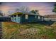 A serene backyard view with a well-maintained lawn and a privacy fence, creating an inviting outdoor space at 1442 Northbrook Dr, Indianapolis, IN 46260