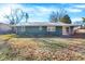 Home's backyard features a patio and grassy area, perfect for outdoor enjoyment and entertaining at 1442 Northbrook Dr, Indianapolis, IN 46260