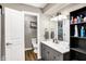 Contemporary bathroom with dual vanity and a separate toilet room at 1442 Northbrook Dr, Indianapolis, IN 46260