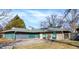 Lovely home with a stone facade, attached garage, and well-kept front yard at 1442 Northbrook Dr, Indianapolis, IN 46260