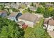 Enjoy this aerial view of a home with a beautiful backyard, deck, and screened porch at 18725 Wychwood Pl, Noblesville, IN 46062