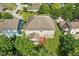 Aerial view of a home with a well-maintained backyard, complemented by a deck for outdoor relaxation at 18725 Wychwood Pl, Noblesville, IN 46062