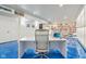 Finished basement featuring bright floors, a white desk, and display shelving at 18725 Wychwood Pl, Noblesville, IN 46062