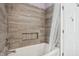 Bathroom featuring a shower, white tile, and a niche at 18725 Wychwood Pl, Noblesville, IN 46062