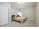 Cozy bedroom featuring neutral tones, plush carpeting, and ample closet space for a serene and restful retreat at 18725 Wychwood Pl, Noblesville, IN 46062