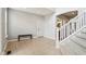 Bright foyer with tile flooring, staircase, neutral walls, and natural light at 18725 Wychwood Pl, Noblesville, IN 46062