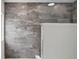 Bathroom features glass-enclosed shower with gray marble-style tiling at 18725 Wychwood Pl, Noblesville, IN 46062