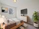 Bright bedroom with a comfy bed and stylish dresser at 403 Wellington Blvd, Shelbyville, IN 46176