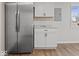 Stainless steel refrigerator in a newly remodeled kitchen at 403 Wellington Blvd, Shelbyville, IN 46176