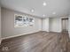 Bright and airy living room with hardwood floors at 403 Wellington Blvd, Shelbyville, IN 46176