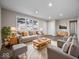 Spacious living room with hardwood floors and modern furniture at 403 Wellington Blvd, Shelbyville, IN 46176