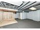 Unfinished basement ready for customization, featuring exposed beams and utilities at 493 Clearwater Blvd, Whiteland, IN 46184