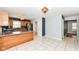 Kitchen showcasing stainless steel appliances, a breakfast bar, and access to the backyard at 493 Clearwater Blvd, Whiteland, IN 46184