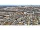 Aerial view of the neighborhood with a cityscape in the distance at 55 E Regent St, Indianapolis, IN 46225