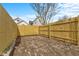 Fenced backyard with brick patio and space for outdoor entertainment and relaxation at 55 E Regent St, Indianapolis, IN 46225