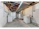 Spacious basement with white walls, a water heater, and laundry hookups at 55 E Regent St, Indianapolis, IN 46225