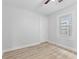 Neutral bedroom featuring modern flooring and window at 55 E Regent St, Indianapolis, IN 46225