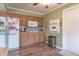 Kitchen features wood cabinets, tile backsplash and includes a built-in microwave at 6149 Winnpeny Ln, Indianapolis, IN 46220