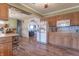 Bright kitchen with wood cabinets, tile backsplash, and stainless steel appliances at 6149 Winnpeny Ln, Indianapolis, IN 46220
