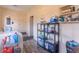Laundry room with storage shelves and washer/dryer at 6149 Winnpeny Ln, Indianapolis, IN 46220