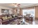 Bright living room with hardwood floors and comfy seating at 6149 Winnpeny Ln, Indianapolis, IN 46220