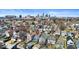Charming neighborhood with an aerial view of cozy homes and the city skyline in the distance at 625 Sanders St, Indianapolis, IN 46203