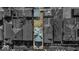 Top-down aerial view shows the layout of the house and its proximity to other homes and neighborhood features at 625 Sanders St, Indianapolis, IN 46203