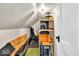 Attic space with carpet, storage shelves, and ample space at 625 Sanders St, Indianapolis, IN 46203