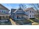 Charming two-story home with a covered front porch and inviting curb appeal at 625 Sanders St, Indianapolis, IN 46203