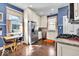 Modern kitchen with stainless steel appliances and a breakfast nook at 625 Sanders St, Indianapolis, IN 46203