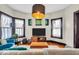 Spacious living room with multiple windows, creating a bright and airy atmosphere at 625 Sanders St, Indianapolis, IN 46203