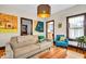 Well-decorated living room featuring a comfortable sofa and stylish accents at 625 Sanders St, Indianapolis, IN 46203