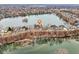 Gorgeous aerial view of a luxury home with a lake view, showcasing the surrounding neighborhood and landscape at 6437 N Oxbow Way, Indianapolis, IN 46220