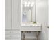 Bathroom with a pedestal sink featuring unique gilded legs and ample storage space at 6437 N Oxbow Way, Indianapolis, IN 46220